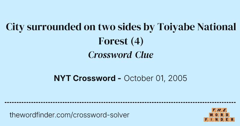 City surrounded on two sides by Toiyabe National Forest crossword clue image