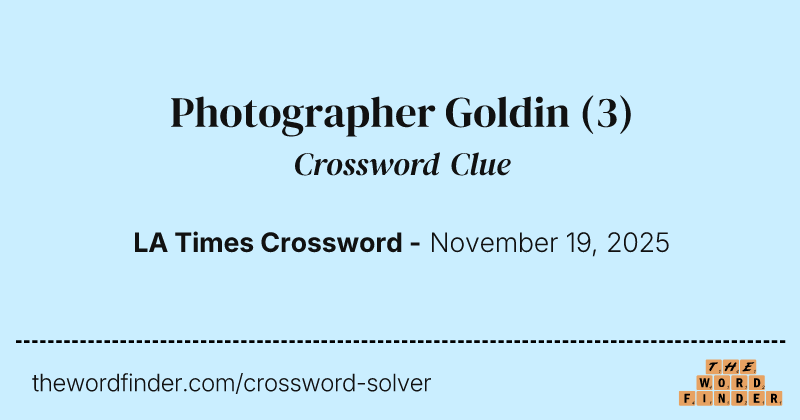 Photographer Goldin crossword clue image